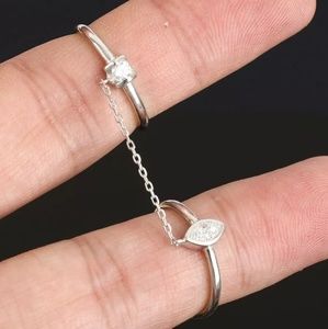 Double love ring w/white Topaz on sterling silver